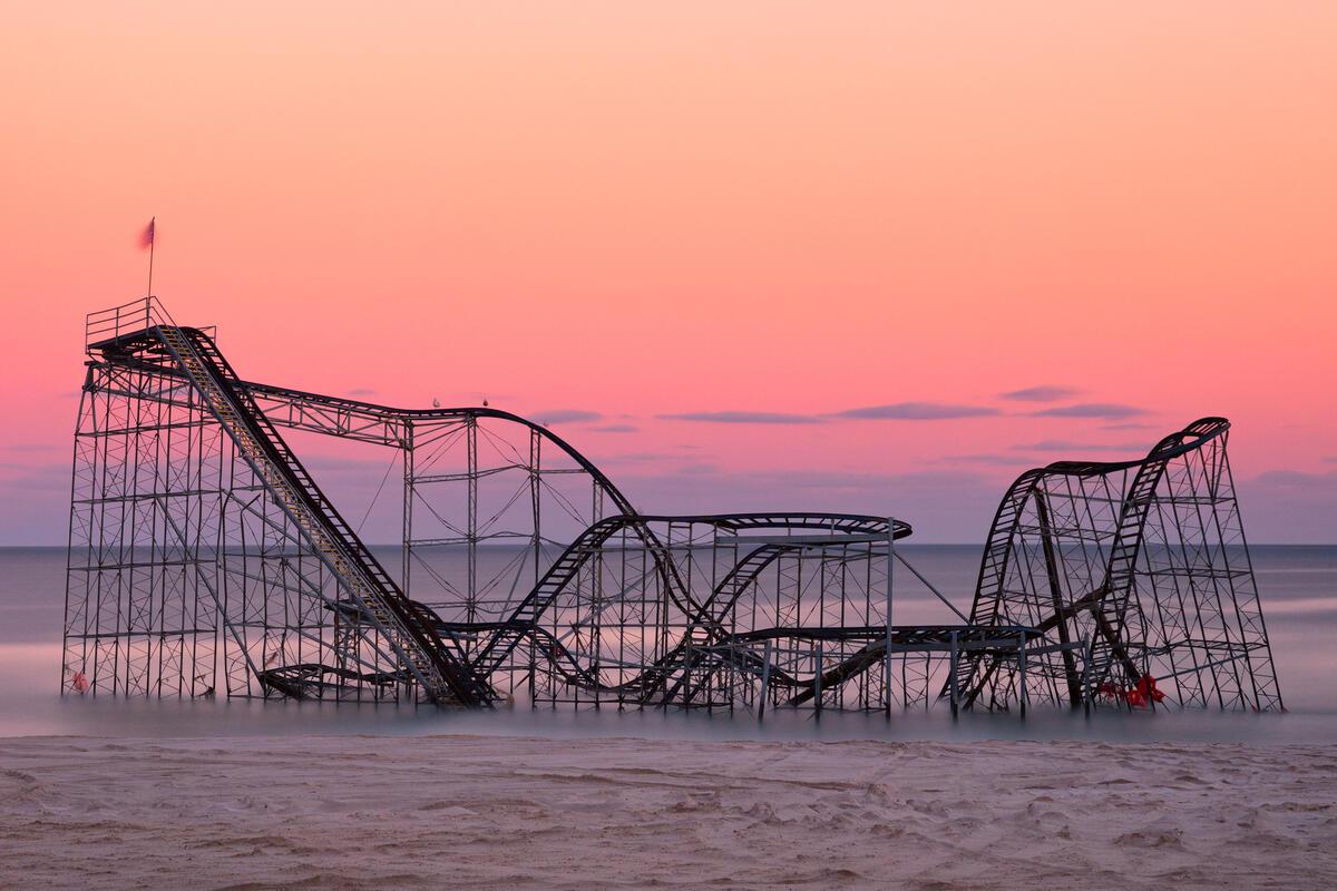 Empty roller coaster rises up out of floodwaters