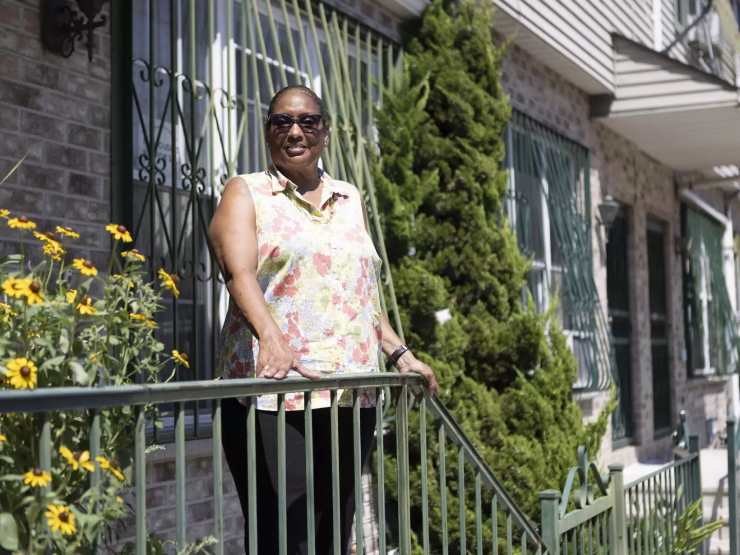 Pamela Pettyjohn on her front balcony