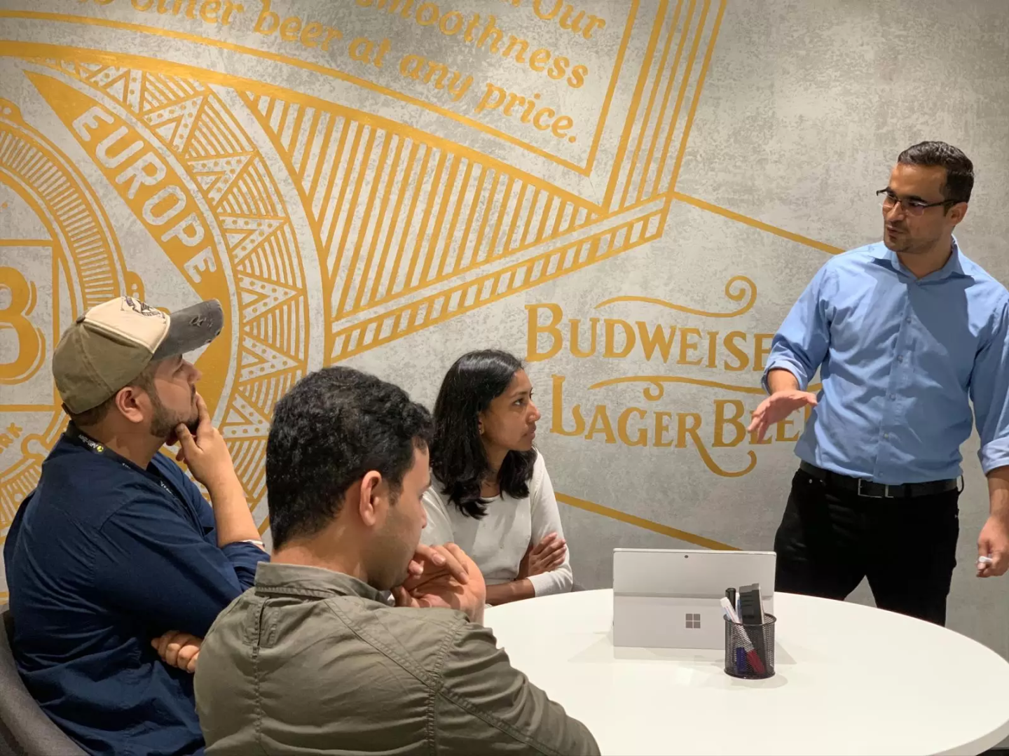 Climate Corps alumnus, Inesh Singh, (right) now leads regional agricultural sustainability efforts for the biggest beer company in the world, AB InBev.