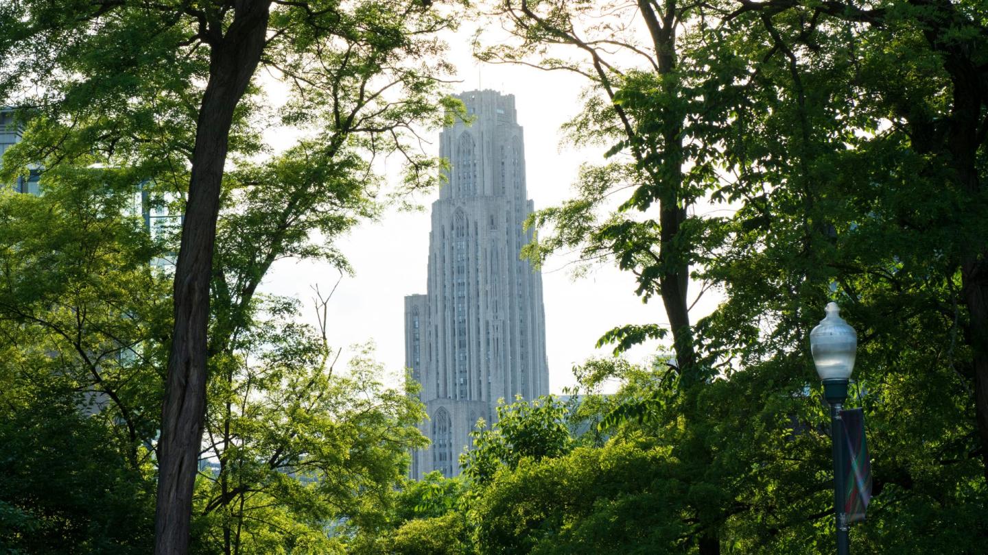 The Cathedral of Learning seen through the trees on the University of Pittsburgh campus