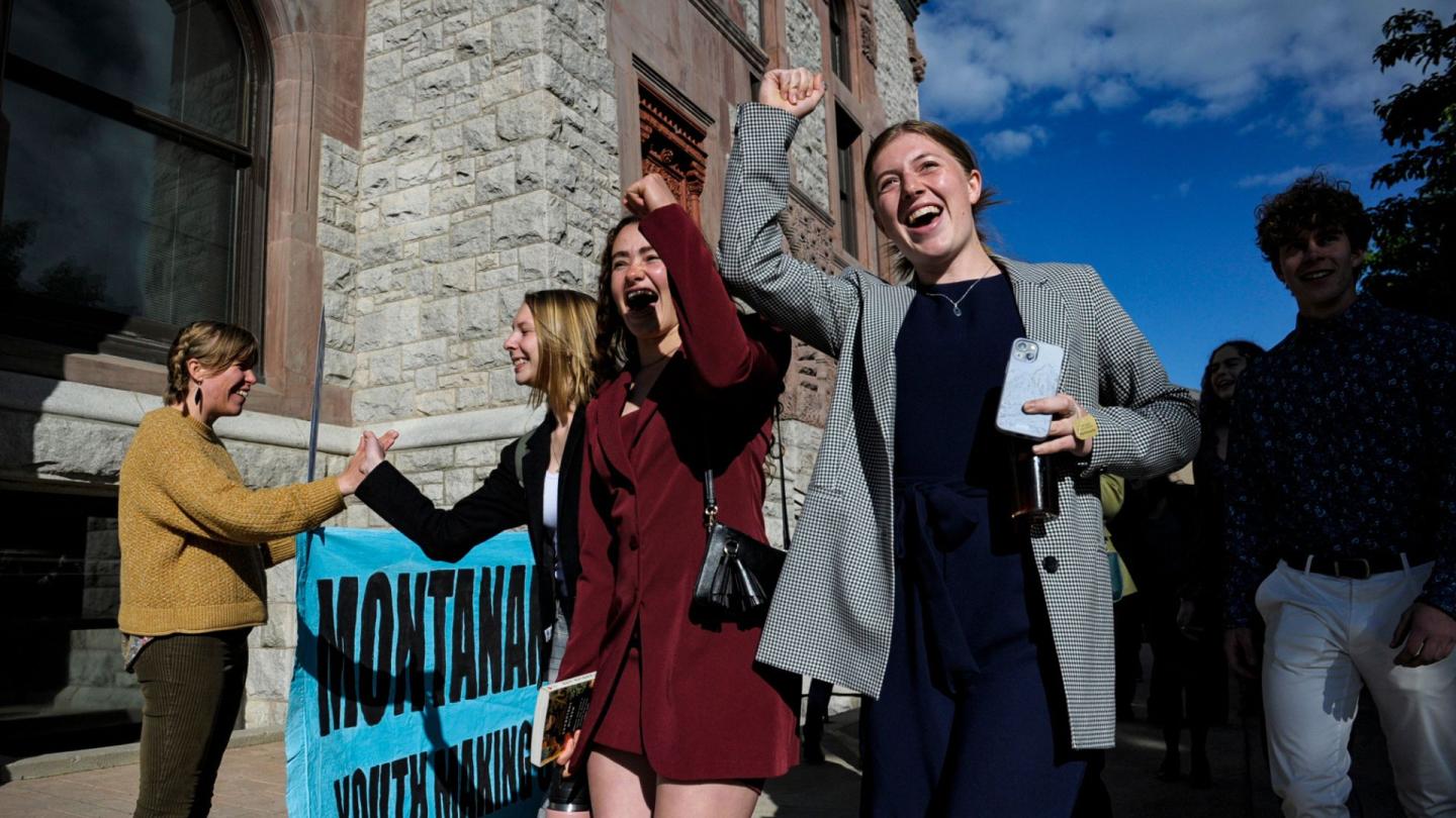 A group of youths celebrating after a historic climate court win in Montana