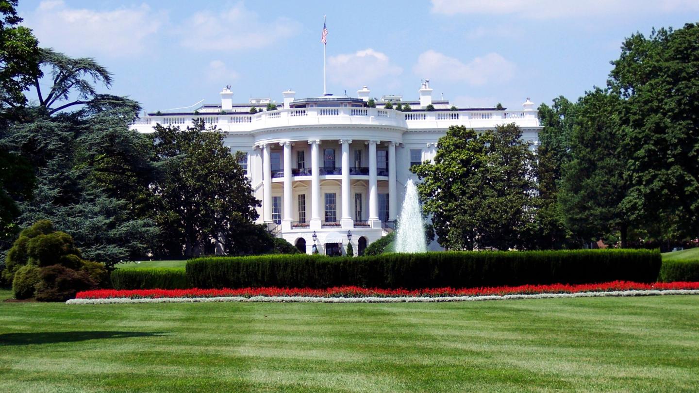 The White House under a blue sky