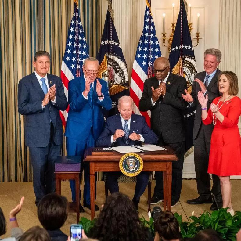 President Joe Biden signing the Inflation Reduction Act