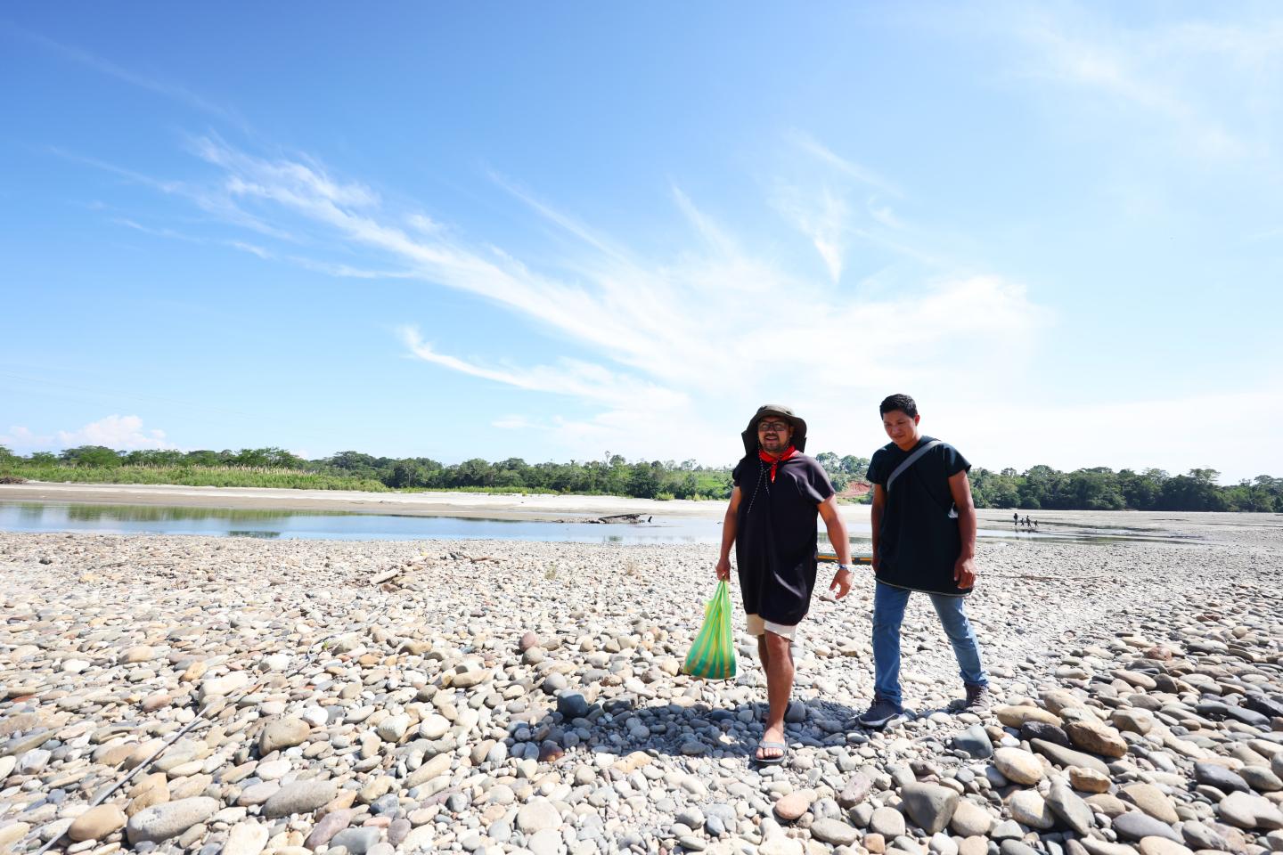 Ramiro Ortiz walking the stone path back to his community