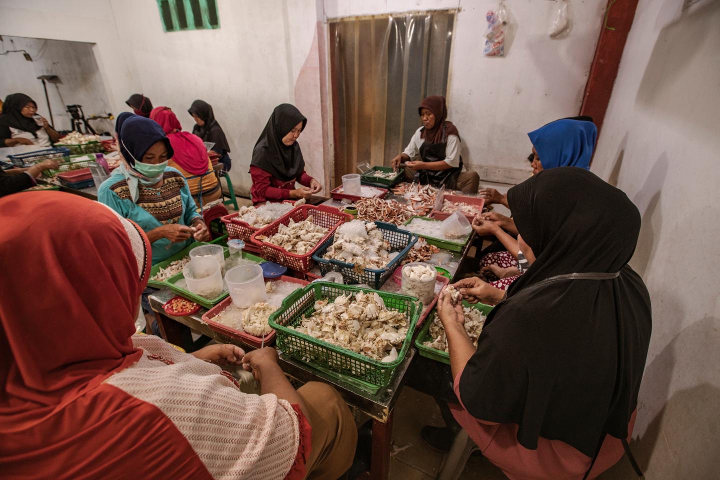 The Pendawi women’s group uses the fat of blue swimming crabs to make highly nutritious crackers and other snacks