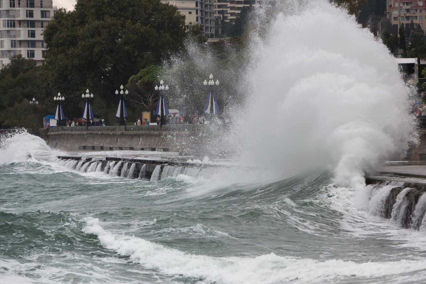 Storm surge as huge waves engulf a city boardwalk