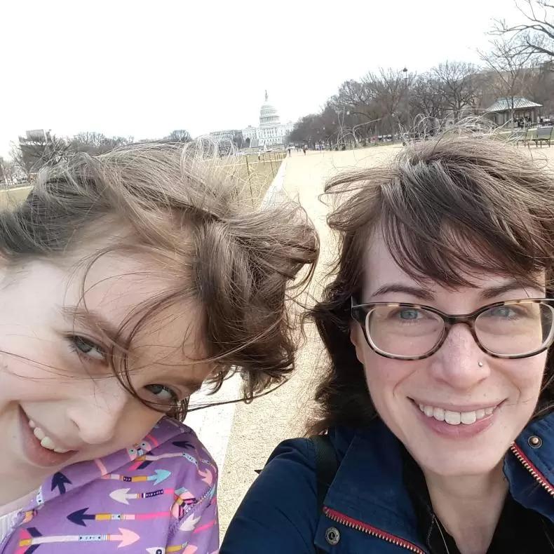 Brooke Petry and her daughter posing for a selfie in front of the U.S. Capitol