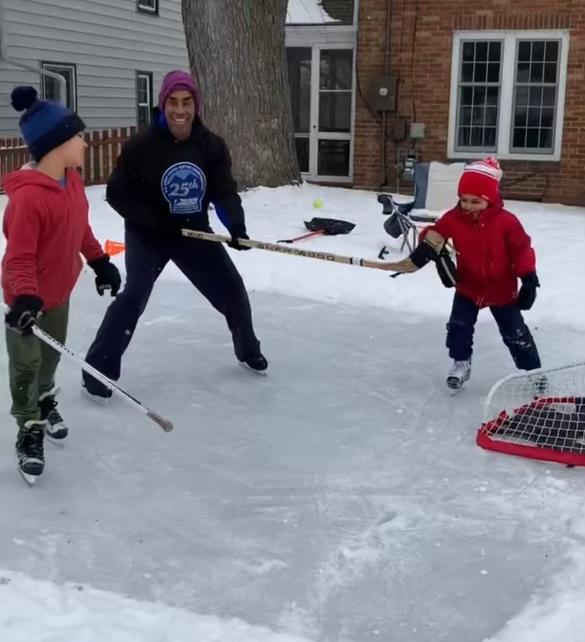 Chris Williams plays hockey in a backyard rink he built 
