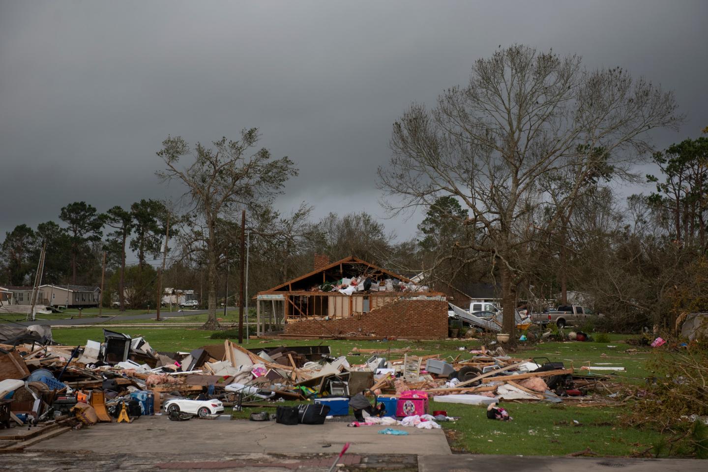 A path of destruction and strewn about items after a hurricane