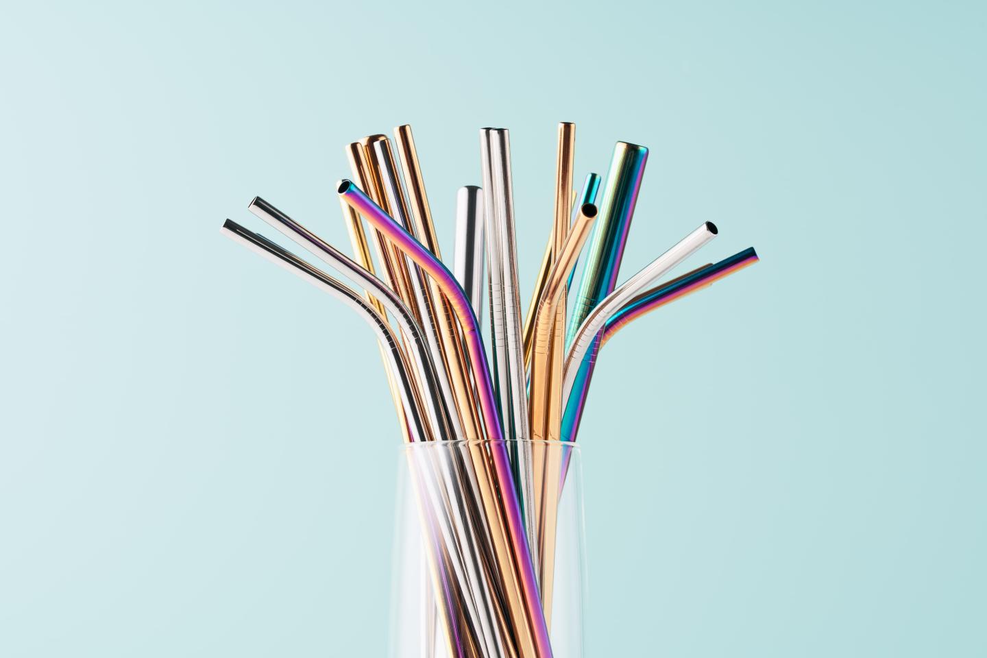 A cupful of metal straws