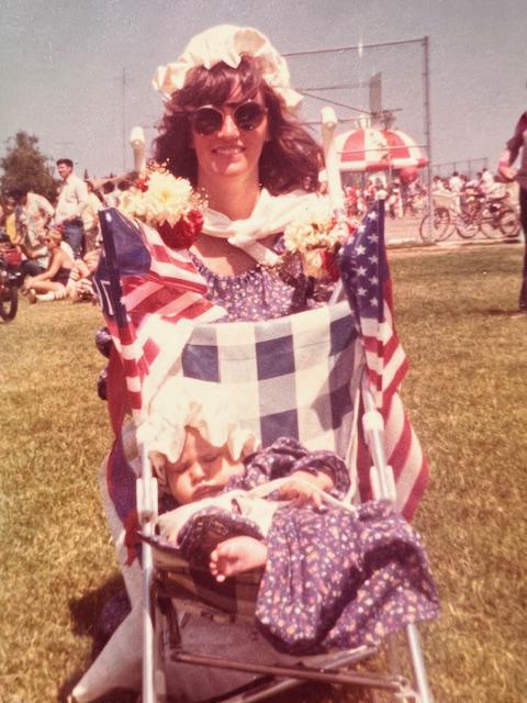 Hazel Chandler pushing her newborn Jen in a stroller in 1976