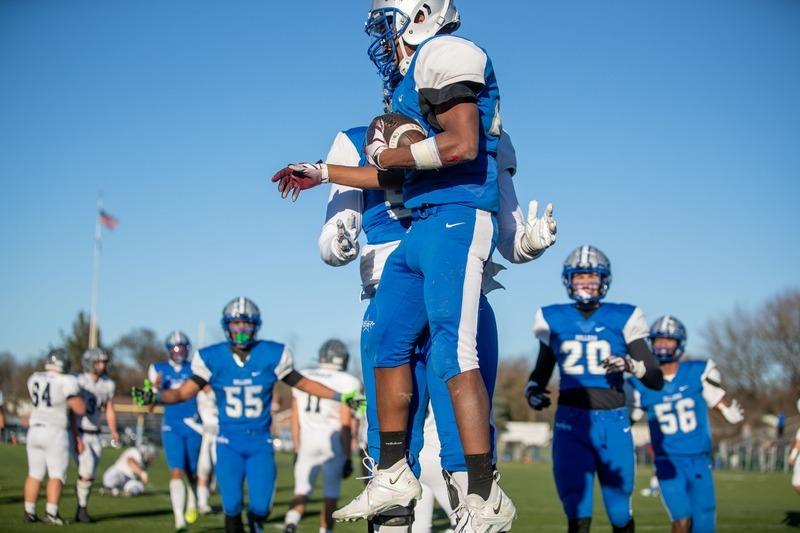 Football players jumping in celebration