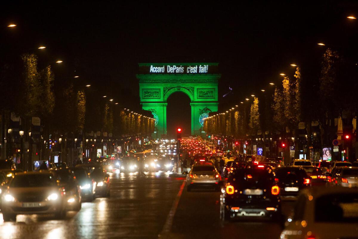 Arc de Triomphe lit in green to celebrate the Paris Agreement