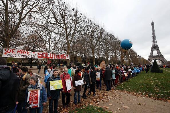 Climate protest in Paris near Eiffel Tower