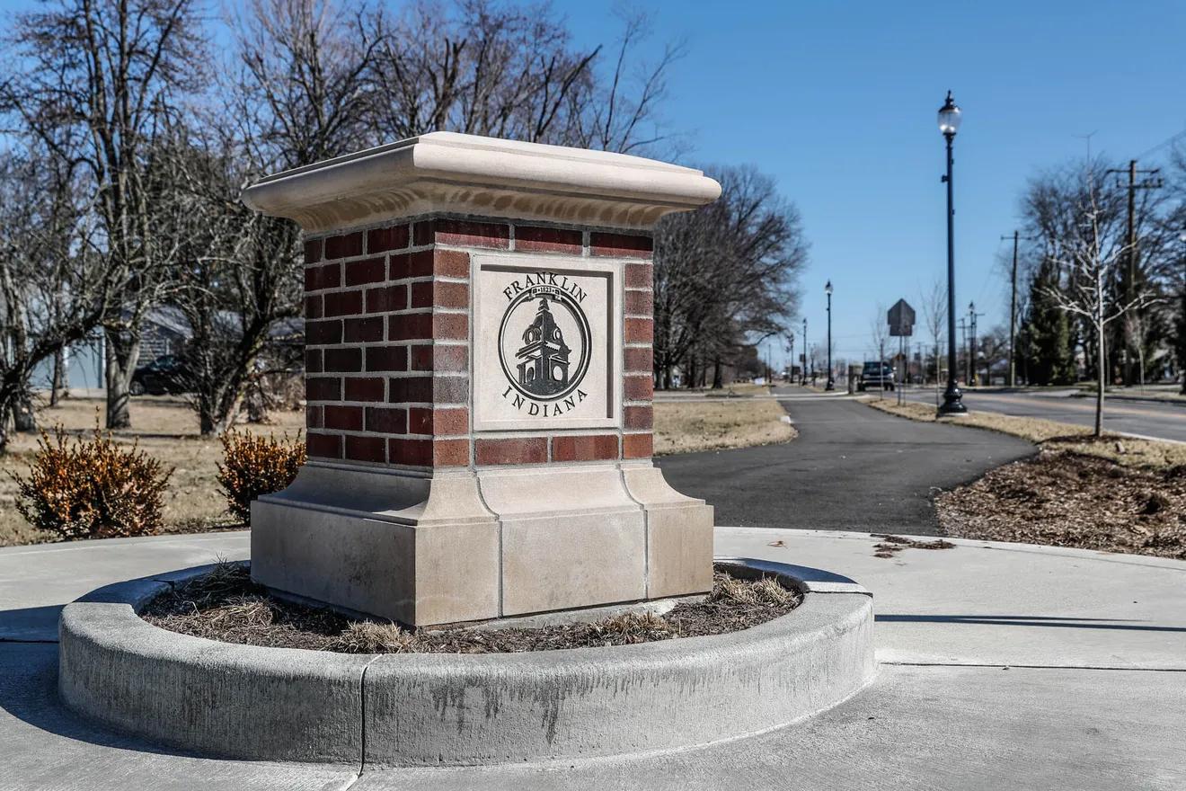 A stone pillar with Franklin, Indiana on it