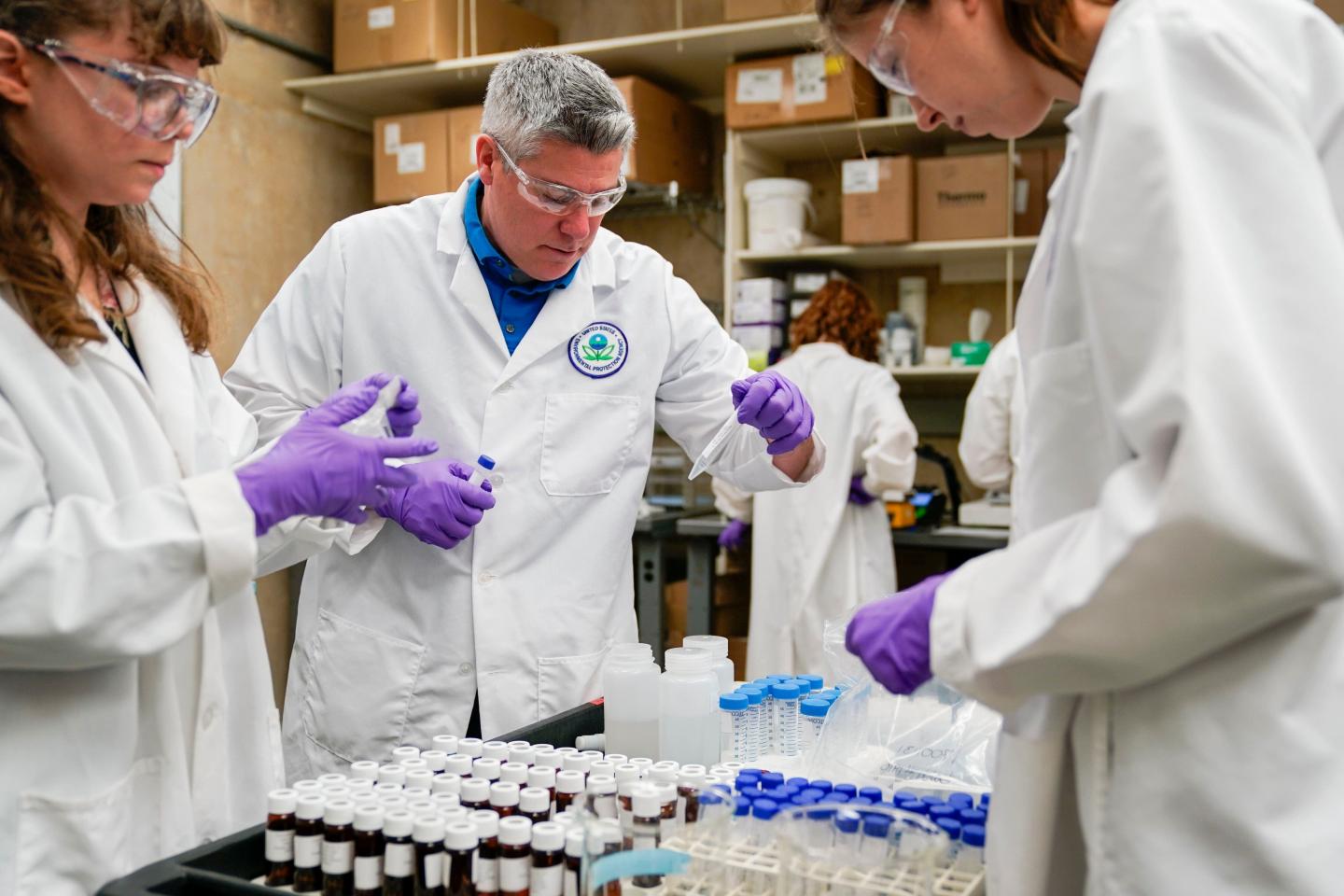 A group of scientists doing science stuff
