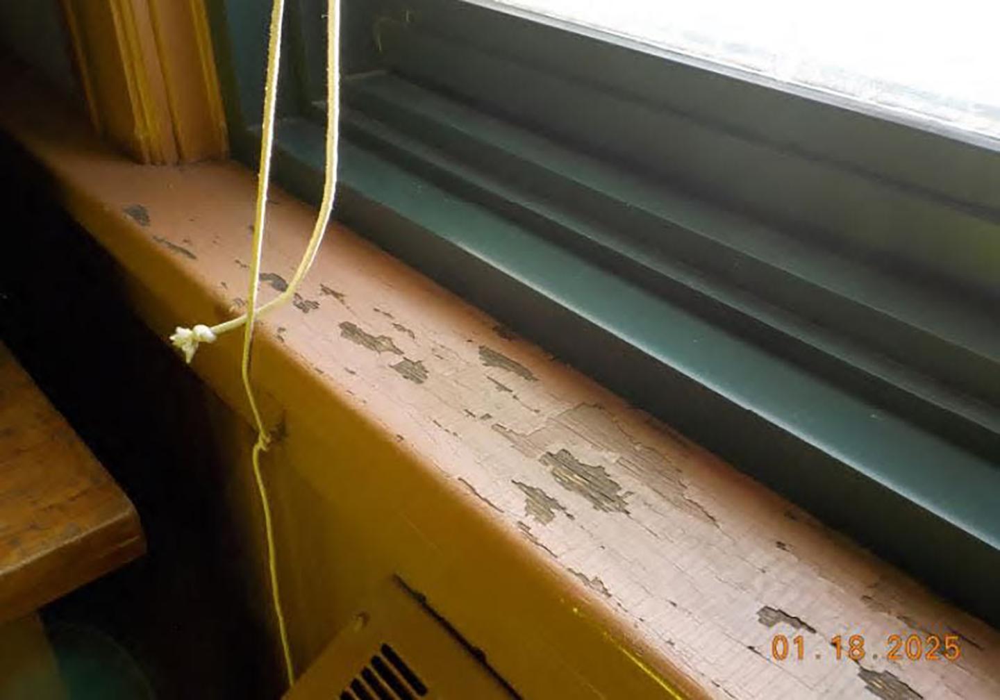 Lead paint chipping on a windowsill