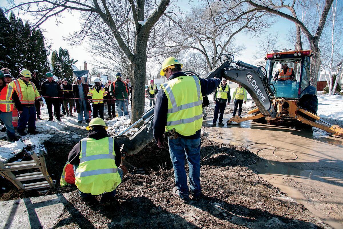 Construction workers removing lead pipes in Flint, Michigan
