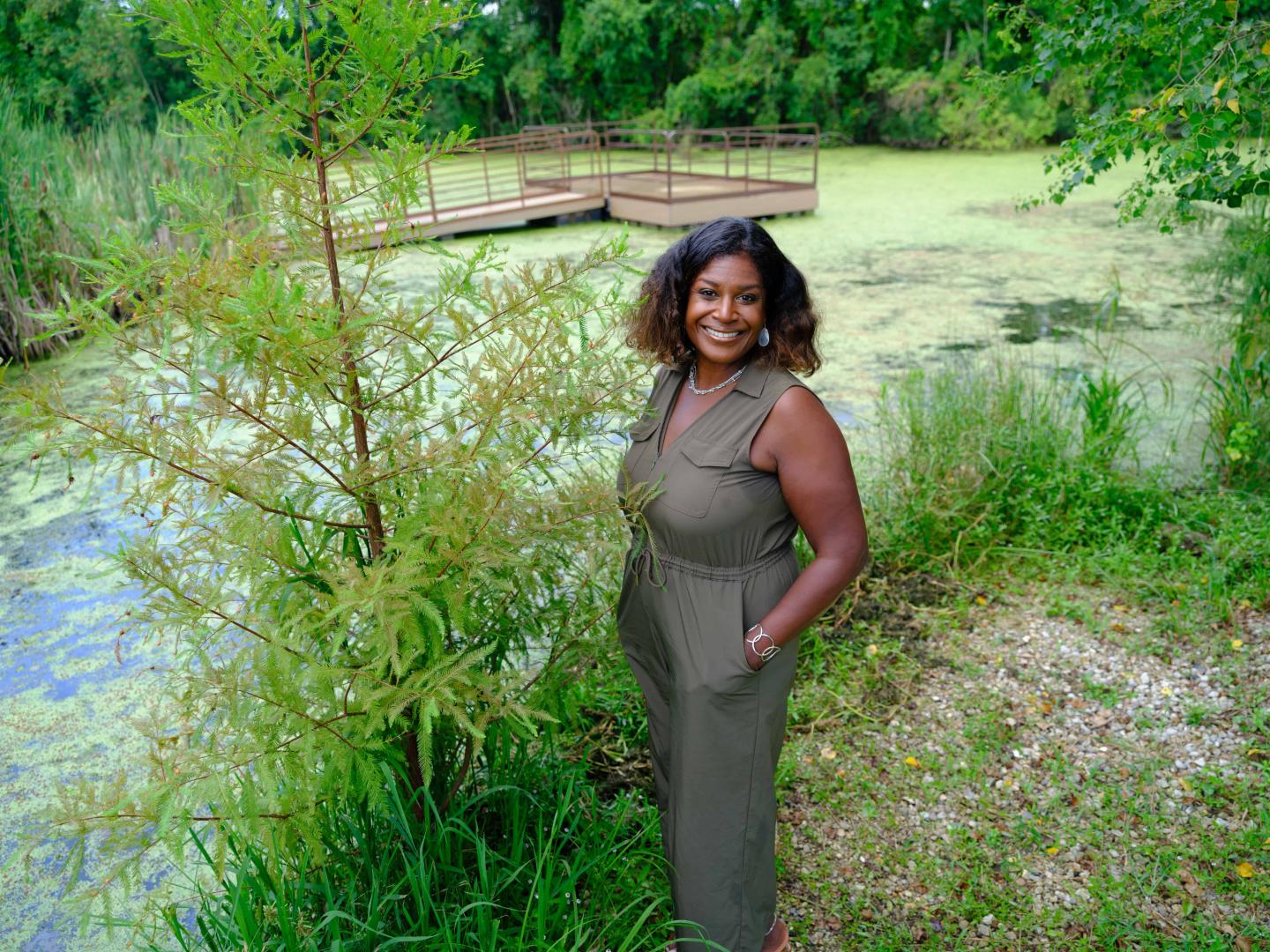 Rashida Ferdinand standing near a wetland