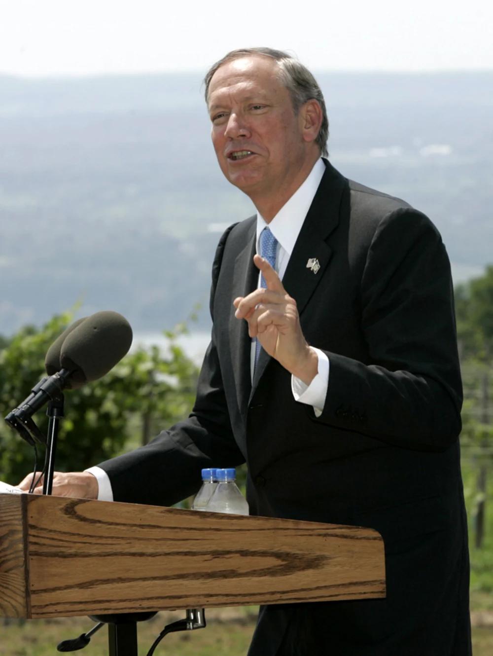 Governor George Pataki standing at a podium