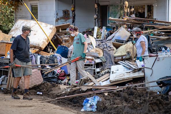 Volunteers clearing out a home in Asheville, 2024