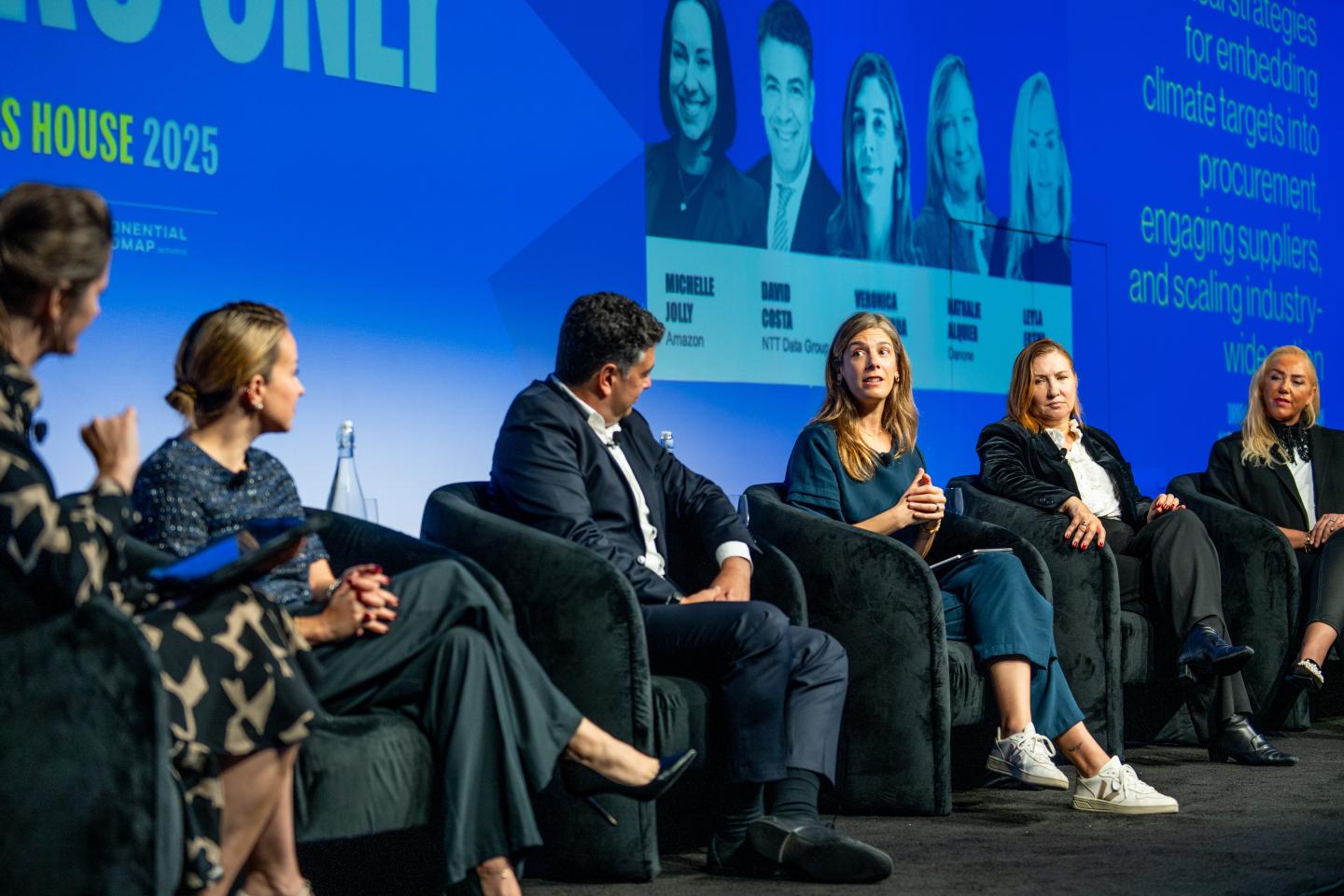 Panel of speakers on a stage