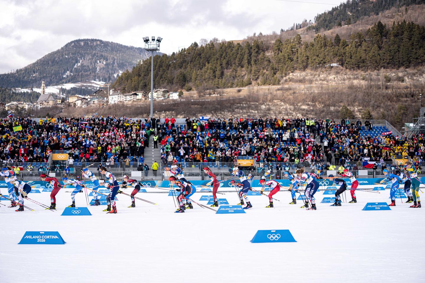 Olympians doing cross country skiing