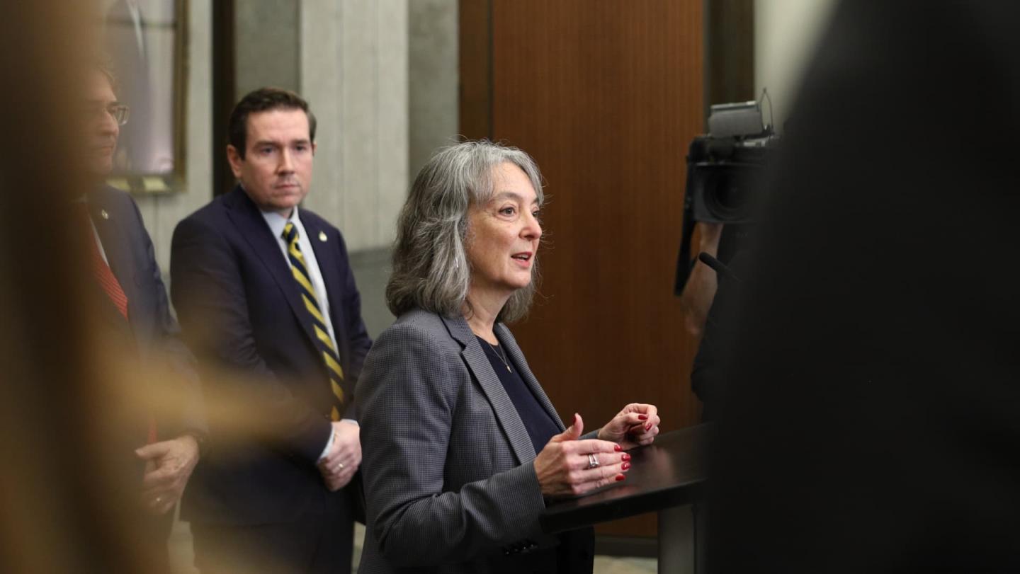 Minister of Environment, Climate Change and Nature Julie Dabrusin standing at a podium