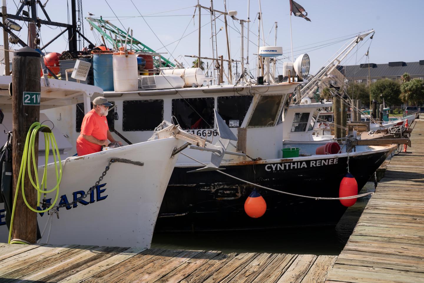 A fishing boat docked in a marina