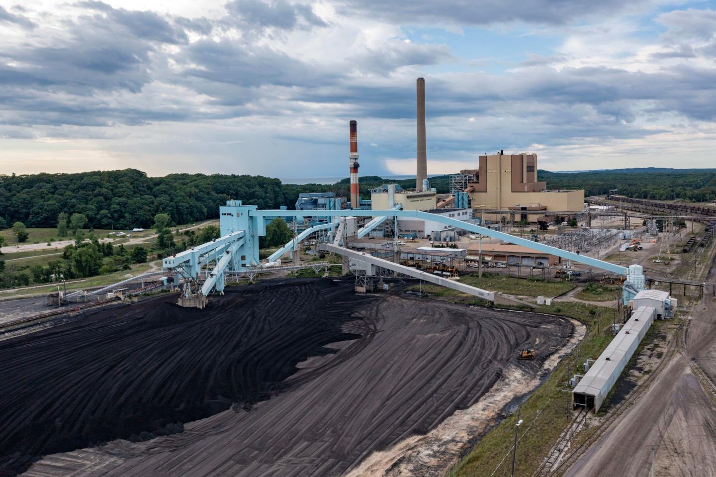 Piles of coal outside of a coal power plant
