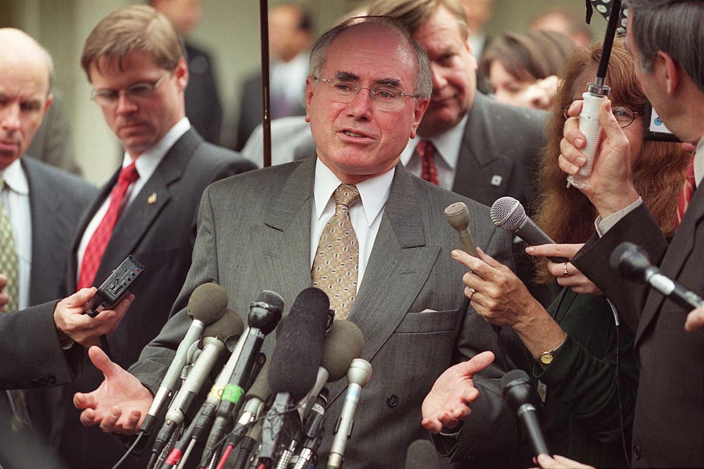 Australian Prime Minister John Howard in 1999 talking to reporters