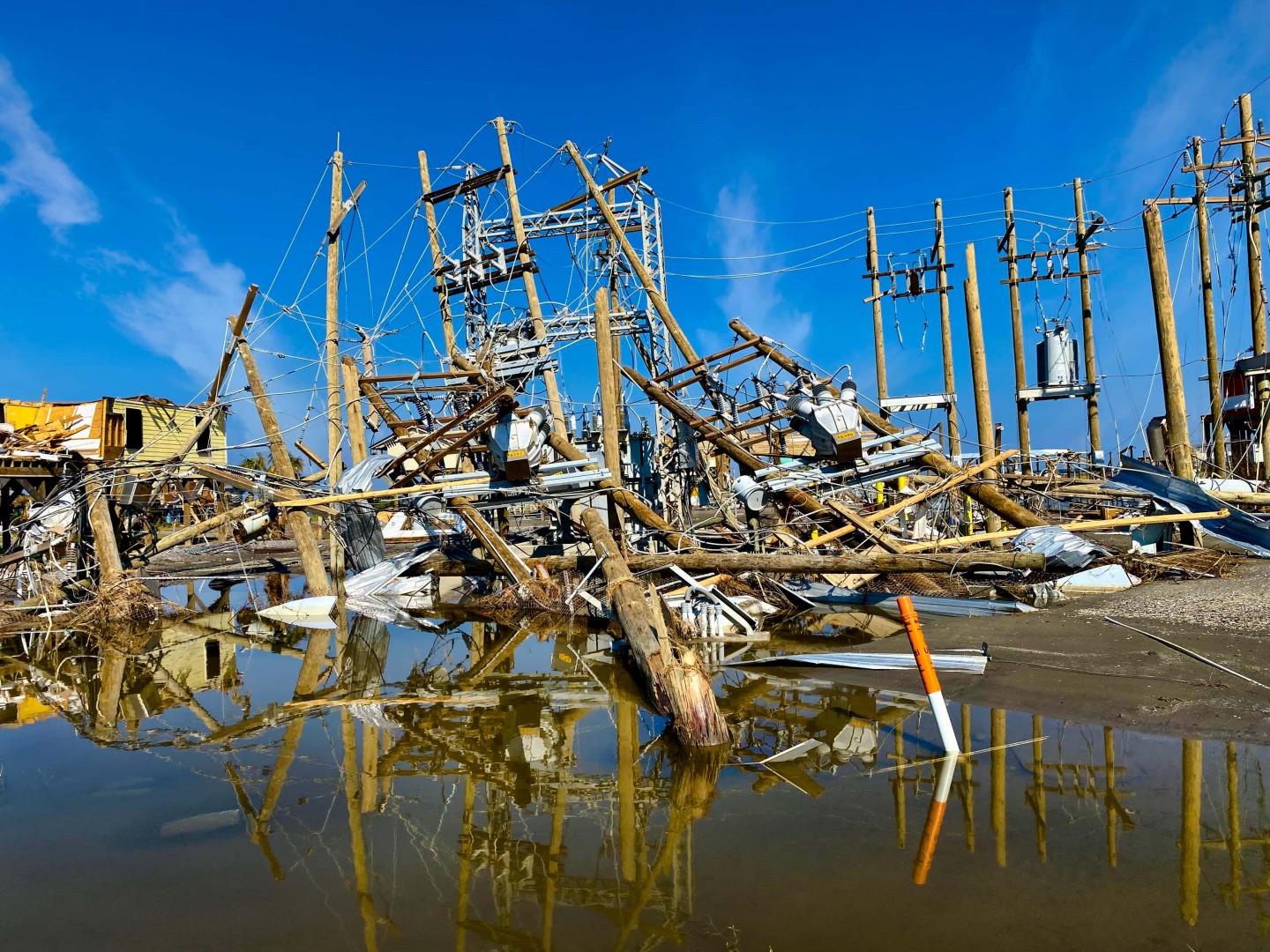 Destroyed power lines and electrical infrastructure in Grand Isle, Louisiana, after Hurricane Ida