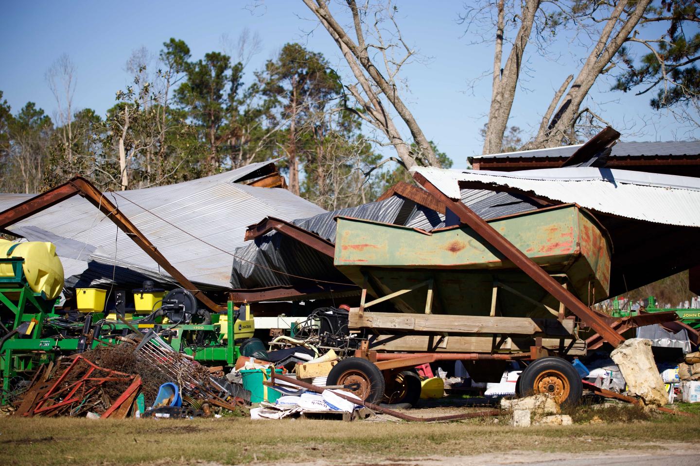Destroyed equipment barn on a farm after Hurricane Helene 