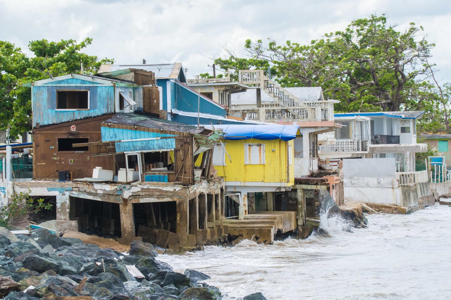 A battered seaside community in Rincon