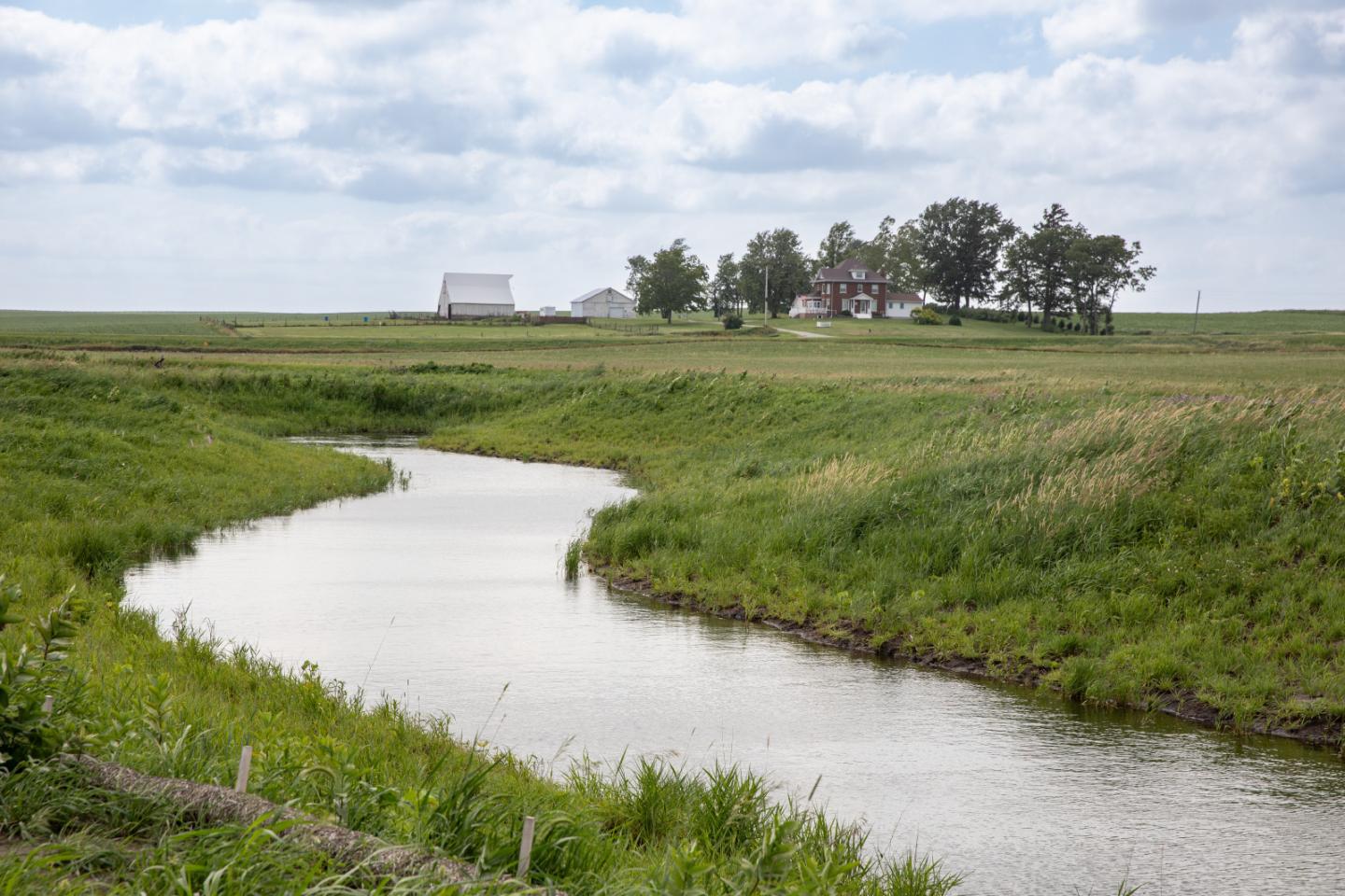 A winding waterway on a farm