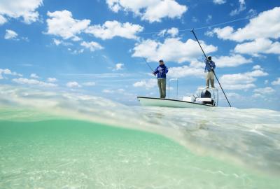 Two people fly fishing in the Bahamas