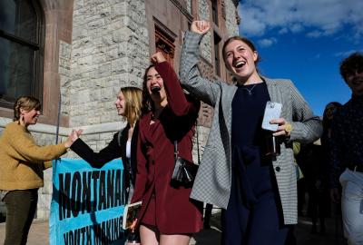 A group of youths celebrating after a historic climate court win in Montana
