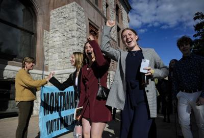 A group of young people celebrate after a climate court win in Montana