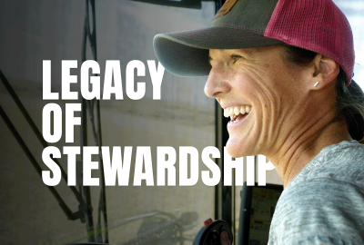 Cori Wittman Stitt on a tractor smiling with the words "Legacy of stewardship" imposed next to her