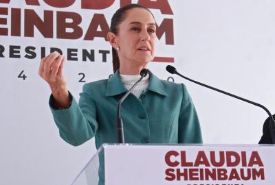 Claudia Sheinbaum speaking at a podium