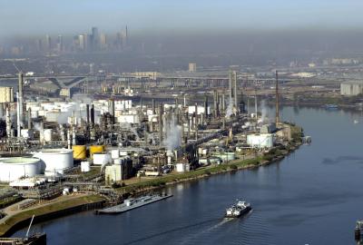 An aerial view of the Houston Ship Channel with petrochemical facilities lining the shores