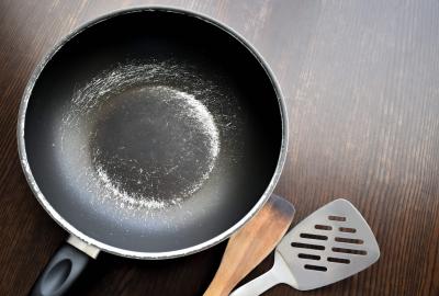 A scratched up non-stick pan