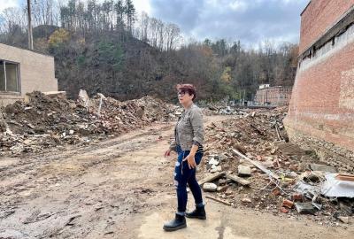 Alex Webber surveying  the damage after Hurricane Helene