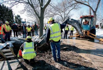 Construction workers removing lead pipes in Flint, Michigan