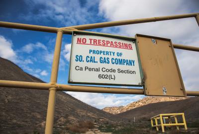 Sign that says "No Trespassing, Property of So.Cal. Gas Company, Ca Penal Code Section 602(L)"
