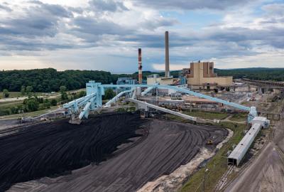 Piles of coal outside of a coal power plant