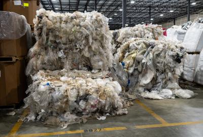Overflowing pallets of plastic waste