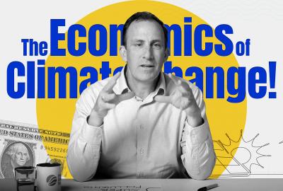 Chris Costello sitting at a desk with the graphic "The economics of climate change" imposed behind him