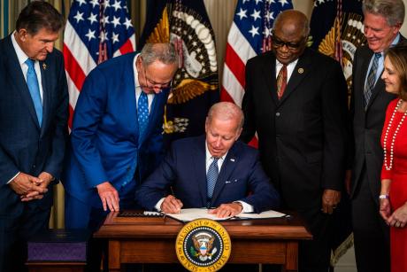 Joe Biden signing the Inflation Reduction Act
