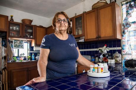 Veronica Melendez standing in her kitchen